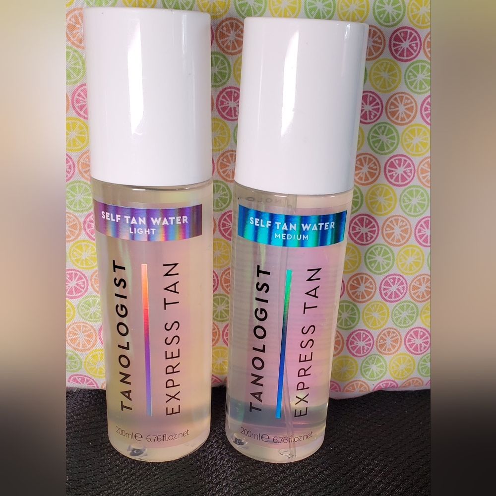 TWO tanologist express tan self tan water.  one in light, and one in medium.